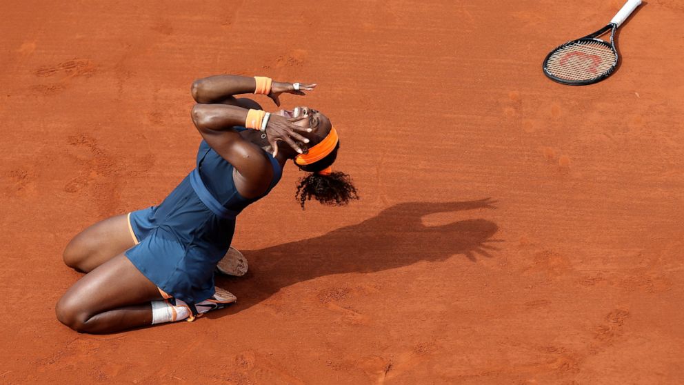 FILE - Serena Williams, of the U.S., celebrates as she defeats Russia's Maria Sharapova during the women's final match of the French Open tennis tournament at Roland Garros stadium Saturday, June 8, 2013 in Paris. Williams won 6-4, 6-4. Serena Saying