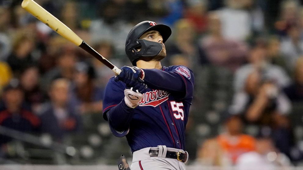Minnesota Twins' Mark Contreras watches his solo home run during the fifth inning of a baseball game against the Detroit Tigers, Saturday, Oct. 1, 2022, in Detroit. (AP Photo/Carlos Osorio)