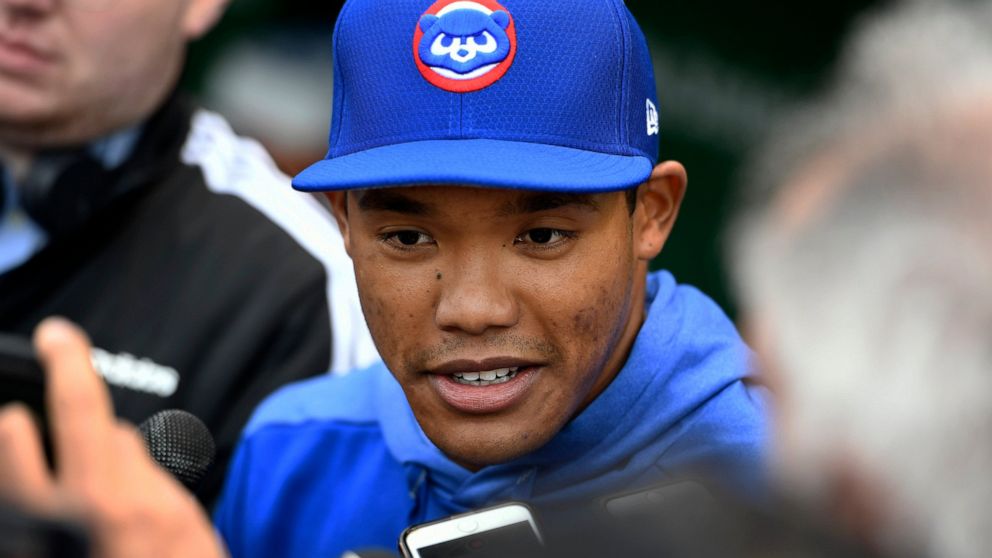 Chicago Cubs shortstop Addison Russell speaks to the media in the dugout before a baseball game against the Miami Marlins, Wednesday, May 8, 2019, in Chicago. Russell rejoins the team after completing a 40-game suspension for violating Major League B