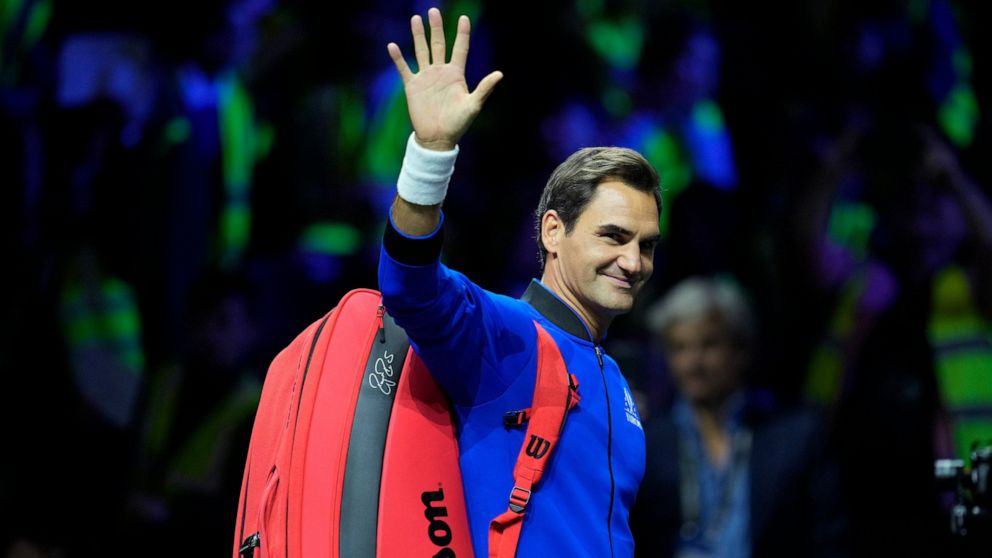 Switzerland's Roger Federer, waves during a training session ahead of the Laver Cup tennis tournament at the O2 in London, Thursday, Sept. 22, 2022. (AP Photo/Kin Cheung)