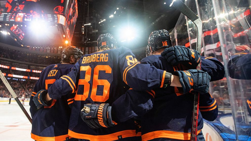 Edmonton Oilers celebrate a goal against the New York Islanders during the second period of an NHL hockey game Friday, Feb. 11, 2022, in Edmonton, Alberta. (Jason Franson/The Canadian Press via AP)