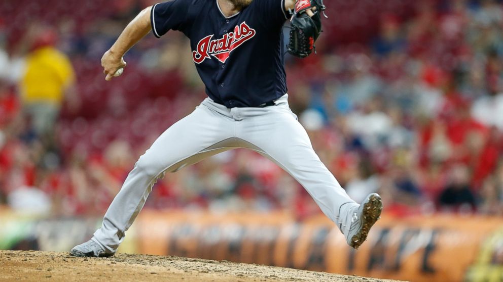 FILE - In this Aug. 15, 2018, file photo, Cleveland Indians relief pitcher Cody Allen throws against the Cincinnati Reds during the eighth inning of a baseball game, in Cincinnati. A person familiar with the negotiations says closer Cody Allen and th