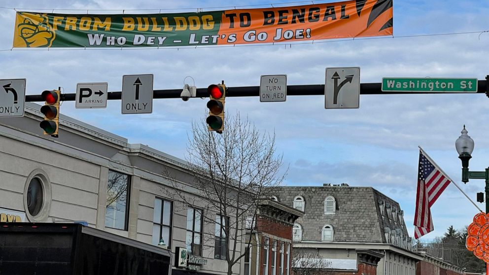 A banner stretched across Court Street in uptown Athens, Ohio, recognizes Joe Burrow's ascension from Athens High School star to Super Bowl quarterback for the Cincinnati Bengals, Wednesday, Feb. 9, 2022. Burrow, who grew up in the nearby village of 