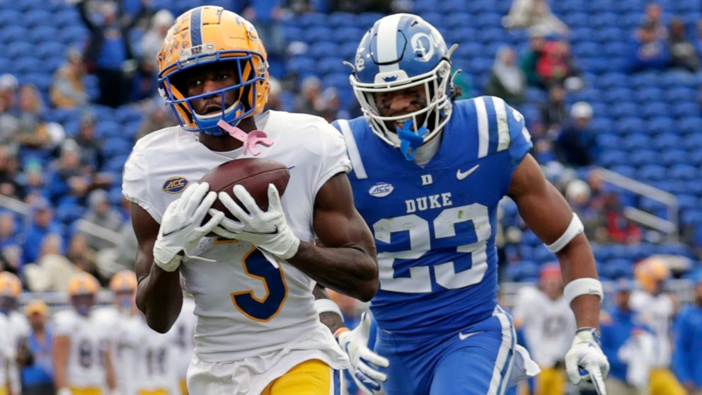 FILE - Pittsburgh wide receiver Jordan Addison (3) hauls in a pass for a touchdown against Duke safety Lummie Young IV (23) during the first half of an NCAA college football game Nov. 6, 2021, in Durham, N.C. Addison is exploring his options. The 202