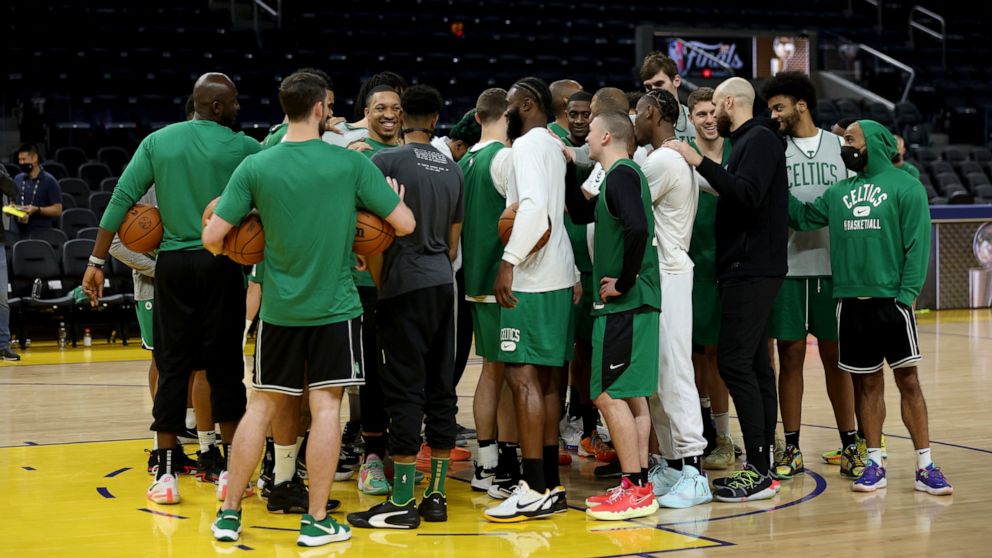 The Boston Celtics huddle during NBA basketball practice in San Francisco, Wednesday, June 1, 2022. The Golden State Warriors are scheduled to host the Celtics in Game 1 of the NBA Finals on Thursday. (AP Photo/Jed Jacobsohn)