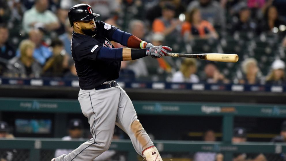 Cleveland Indians first baseman Carlos Santana singles against the Detroit Tigers in the top of the seventh inning of a baseball game, Friday, June 14, 2019, in Detroit. (AP Photo/Jose Juarez)