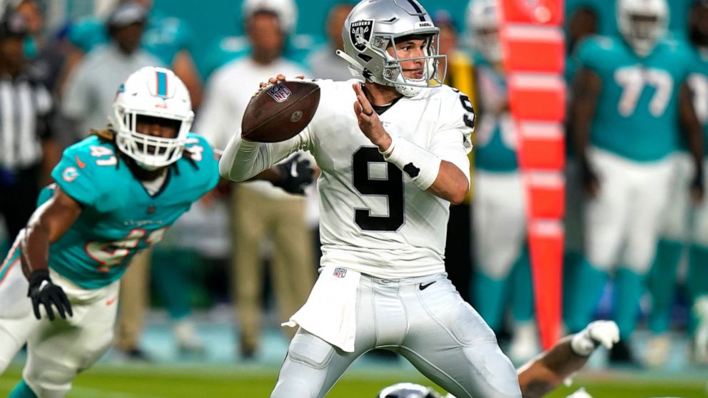 Las Vegas Raiders quarterback Nick Mullens (9) aims a pass during the first half of a NFL preseason football game against the Las Vegas Raiders, Saturday, Aug. 20, 2022, in Miami Gardens, Fla. (AP Photo/Lynne Sladky)