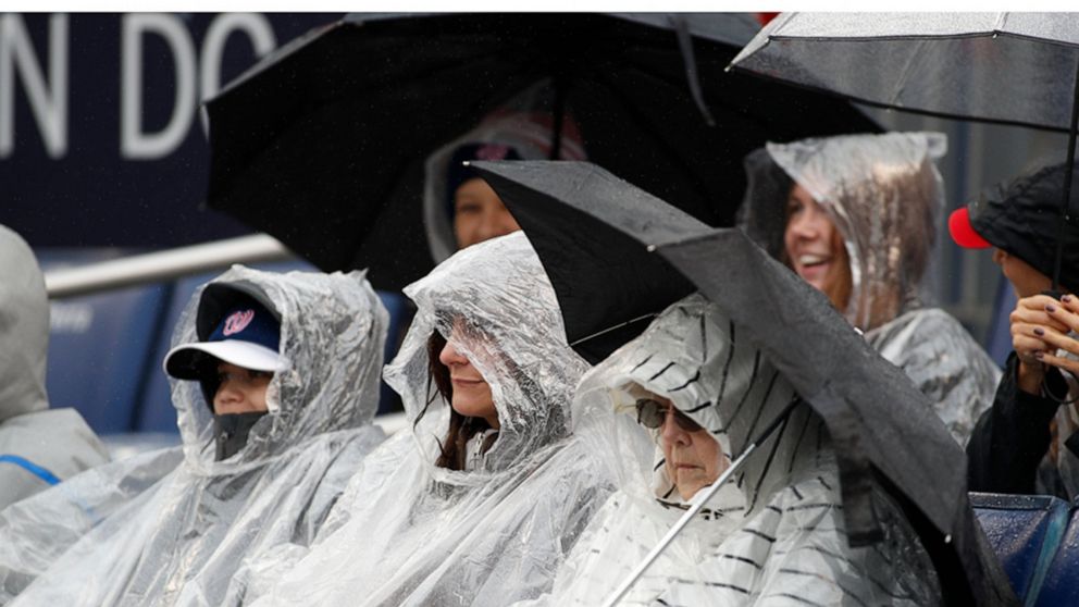 Fans watch the Philadelphia Phillies play against the Washington Nationals in a baseball game, Sunday, Oct. 2, 2022, in Washington. (AP Photo/Luis M. Alvarez)