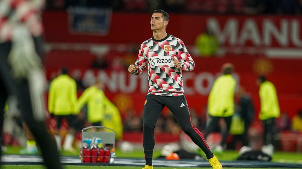 Manchester United's Cristiano Ronaldo warms up ahead of the English Premier League soccer match between Manchester United and Tottenham Hotspur at Old Trafford in Manchester, England, Wednesday, Oct. 19, 2022. (AP Photo/Dave Thompson)