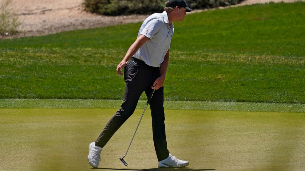 Arizona State golfer Preston Summerhays misses his shot on the second green during the semifinal round of the NCAA college men's match play golf championship, Tuesday, May 31, 2022, in Scottsdale, Ariz. (AP Photo/Matt York)