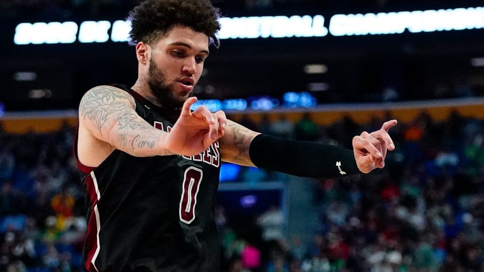 New Mexico State guard Teddy Allen reacts during the second half of the team's college basketball game against Connecticut in the first round of the NCAA men's tournament Thursday, March 17, 2022, in Buffalo, N.Y. (AP Photo/Frank Franklin II)