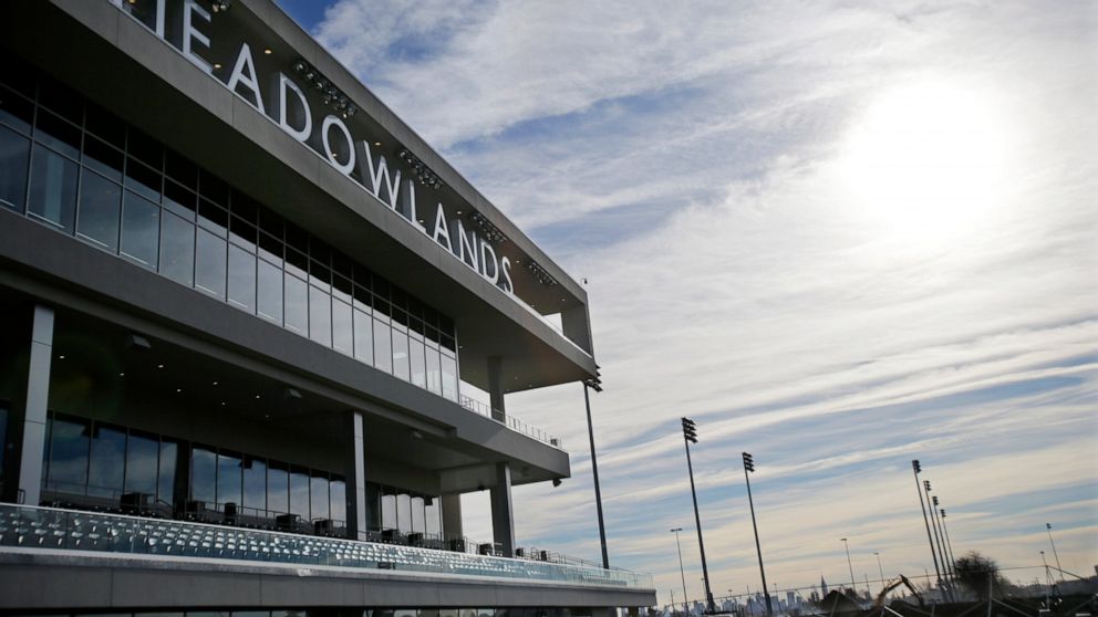 FILE - This Nov. 20, 2013 file photo shows the Meadowlands race track in East Rutherford, N.J. Two years after filing a first-of-its-kind lawsuit, an aggrieved harness-racing bettor has received $20,000 in the settlement of his claims that he was che