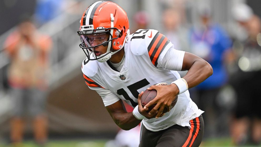 Cleveland Browns quarterback Joshua Dobbs (15) runs in for a touchdown against the Philadelphia Eagles during the first half of an NFL preseason football game in Cleveland, Sunday, Aug. 21, 2022. (AP Photo/David Richard)