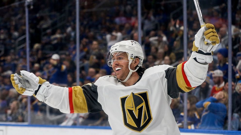 Vegas Golden Knights' Jonathan Marchessault (81) reacts after scoring a goal during the third period of an NHL hockey game against the St. Louis Blues, Friday, April 29, 2022, in St. Louis. (AP Photo/Scott Kane)