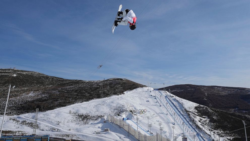 Japan's Kaishu Hirano competes during the men's halfpipe finals at the 2022 Winter Olympics, Friday, Feb. 11, 2022, in Zhangjiakou, China. (AP Photo/Gregory Bull)