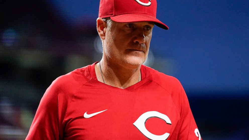 Cincinnati Reds manager David Bell walks to the dugout during the seventh inning of the second baseball game of a doubleheader against the Pittsburgh Pirates, Thursday, July 7, 2022, in Cincinnati. (AP Photo/Jeff Dean)