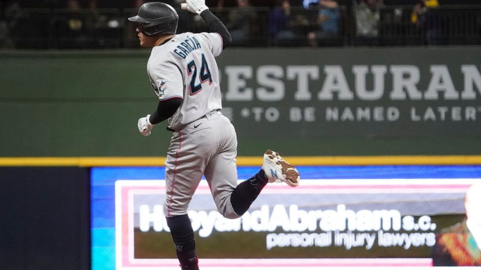 Miami Marlins' Avsail Garcia reacts after hitting a grand slam during the eighth inning of a baseball game against the Milwaukee Brewers Thursday, Sept. 29, 2022, in Milwaukee. (AP Photo/Morry Gash)