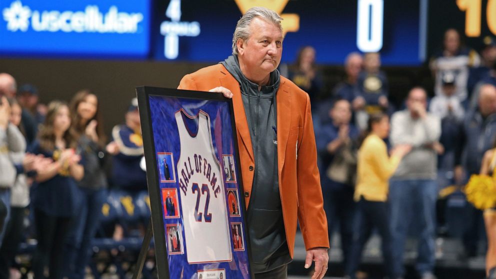 West Virginia coach Bob Huggins is honored during the first half of an NCAA college basketball game against Buffalo in Morgantown, W.Va., Sunday, Dec. 18, 2022. (AP Photo/Kathleen Batten)