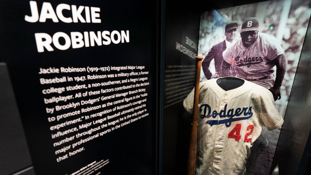 A jersey of Jackie Robinson is displayed at the National Museum of African American History and Culture in Washington, commemorating the 75th anniversary of Jackie Robinson's integration of Major League Baseball, Thursday, April 7, 2022. Robinson bec