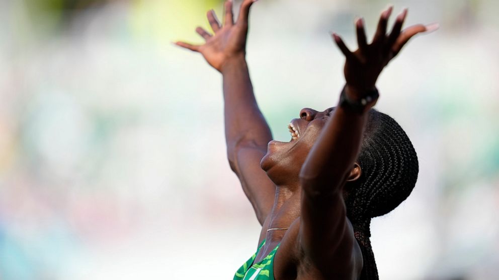 Tobi Amusan, of Nigeria, reacts after winning the women's 100-meter hurdles semifinal at the World Athletics Championships on Sunday, July 24, 2022, in Eugene, Ore. (AP Photo/Ashley Landis)