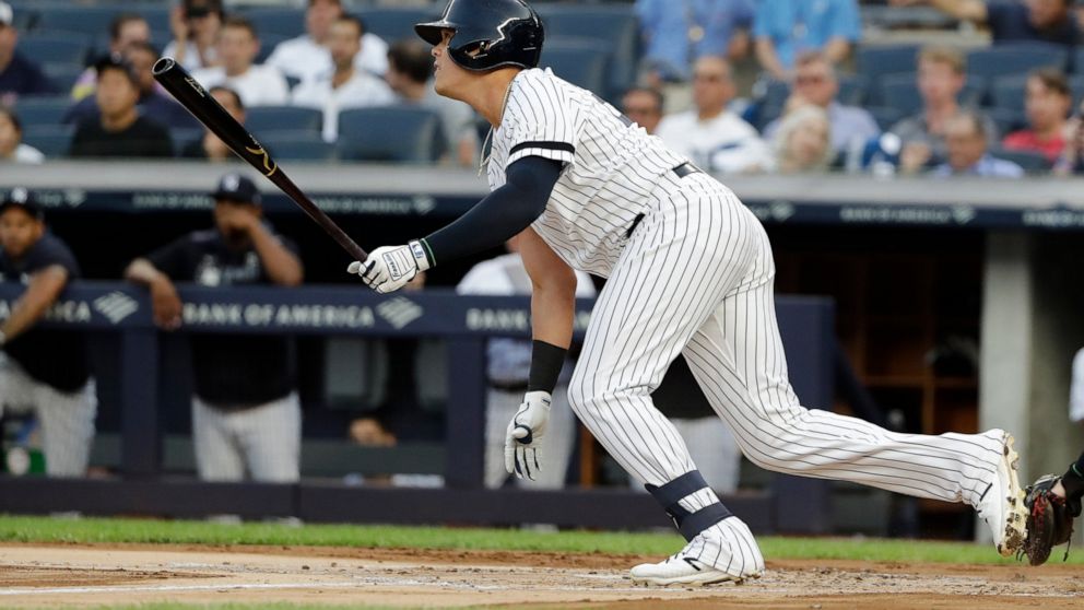 New York Yankees' Gio Urshela follows through on a single during the first inning of a baseball game against the Cleveland Indians, Friday, Aug. 16, 2019, in New York. (AP Photo/Frank Franklin II)