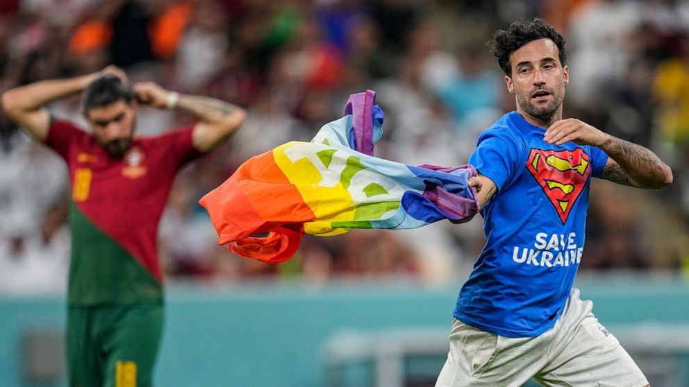 Protester with rainbow flag banned from World Cup matches