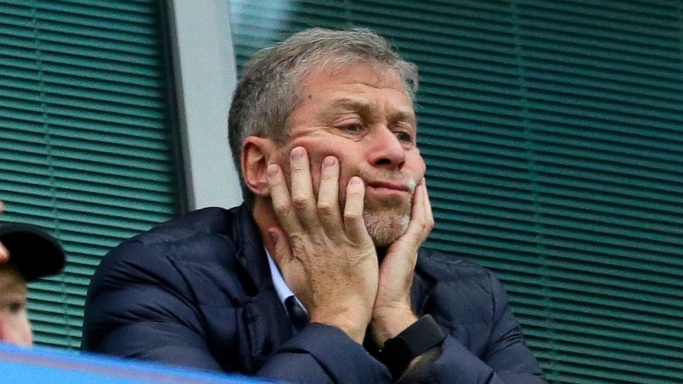 FILE - Chelsea soccer club owner Roman Abramovich sits in his box before their English Premier League soccer match against Sunderland at Stamford Bridge stadium in London, Dec. 19, 2015. Chelsea owner Roman Abramovich has on Saturday, Feb. 26, 2022 s