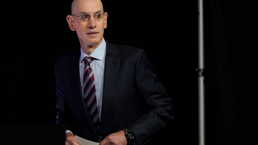 NBA Commissioner Adam Silver arrives at a news conference before Game 1 of basketball's NBA Finals between the Golden State Warriors and the Boston Celtics in San Francisco, Thursday, June 2, 2022. (AP Photo/Jeff Chiu)