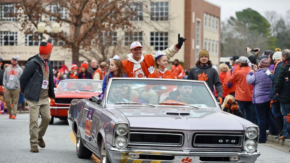 Defensive head coach Brent Venables, along with family members ride in the parade honoring Clemson Saturday, Jan. 12, 2019, in Clemson, S.C., The Tigers defeated Alabama 44-16 in the College Football Playoff championship game Monday Jan. 7. (AP Photo