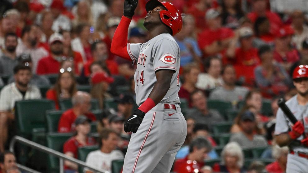 Cincinnati Reds' Aristides Aquino gestures after his solo home run during the sixth inning of the team's baseball game against the St. Louis Cardinals on Thursday, Sept. 15, 2022, in St. Louis. (AP Photo/Joe Puetz)