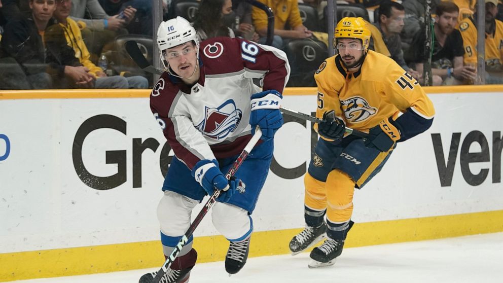 FILE - Colorado Avalanche right wing Nicolas Aube-Kubel (16) moves the puck ahead of Nashville Predators' Alexandre Carrier (45) during the first period in Game 4 of an NHL hockey first-round playoff series Monday, May 9, 2022, in Nashville, Tenn. Th