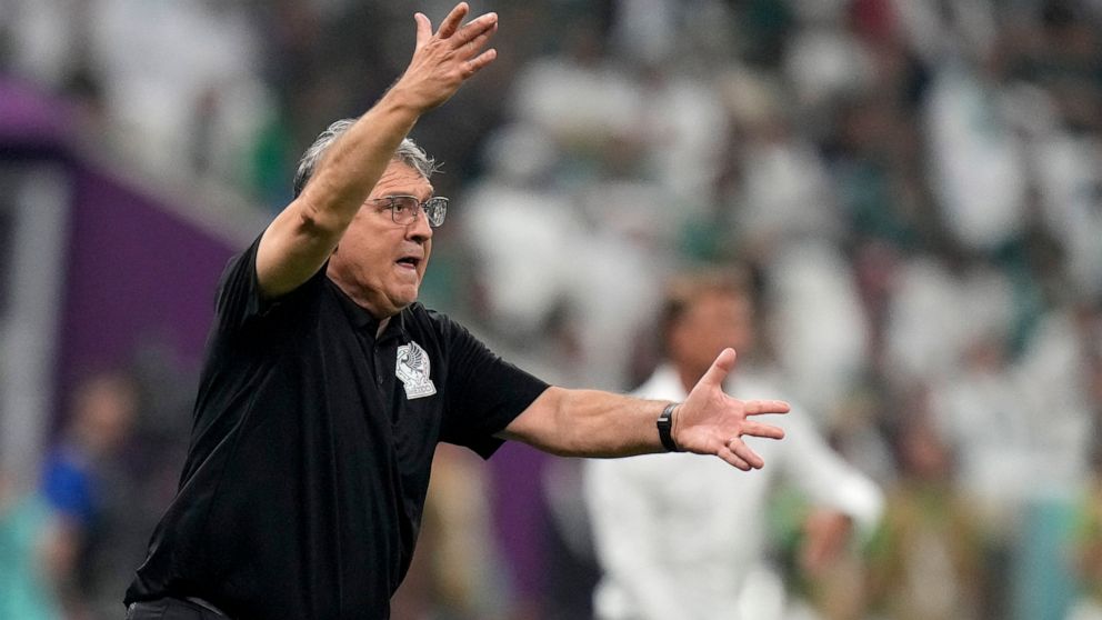 Mexico's head coach Gerardo Martino gestures during the World Cup group C soccer match between Saudi Arabia and Mexico, at the Lusail Stadium in Lusail, Qatar, Wednesday, Nov. 30, 2022. (AP Photo/Moises Castillo)