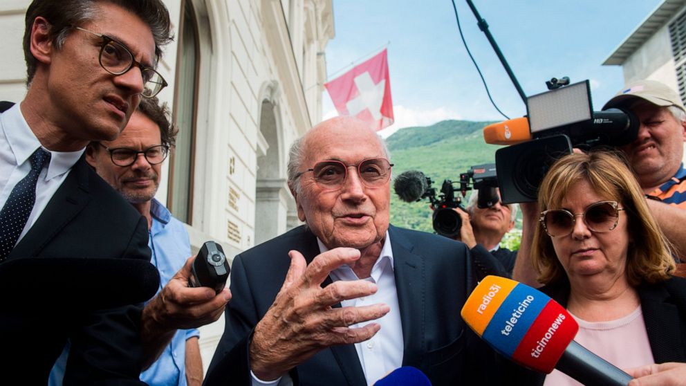 FILE - Former FIFA president Sepp Blatter is surrounded by the media as he leaves the Swiss Federal Criminal Court in Bellinzona, Switzerland, Wednesday, June 8, 2022. Blatter said on Tuesday, Nov. 8, 2022, that picking Qatar to host the World Cup wa