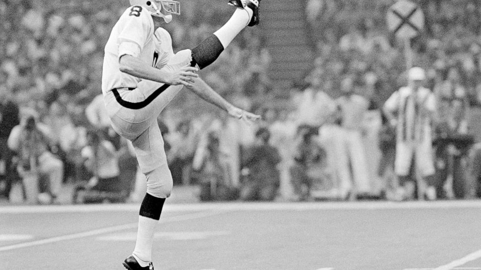 FILE - Oakland Raiders punter Ray Guy kicks during the Super Bowl at the Superdome in New Orleans, Jan. 25, 1981. Ray Guy, the first punter to make the Pro Football Hall of Fame, died Thursday, Nov. 3, 2022, following a lengthy illness. He had been r