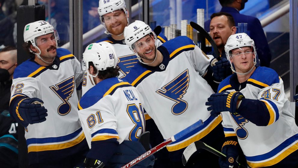 St. Louis Blues left wing James Neal (81) is congratulated for his goal during the second period of the team's NHL hockey game against the San Jose Sharks on Thursday, Nov. 4, 2021, in San Jose, Calif. (AP Photo/Josie Lepe)