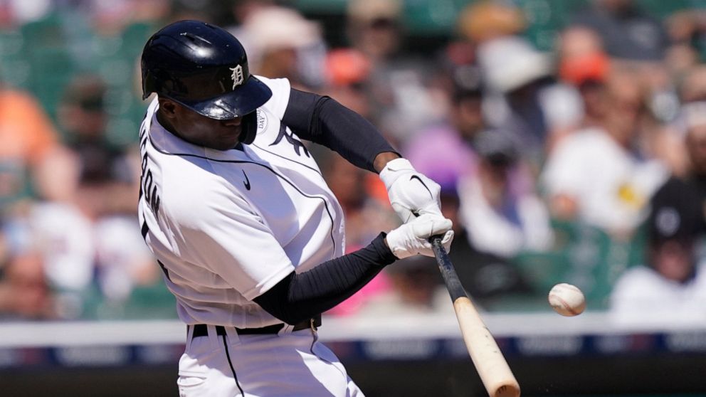Detroit Tigers' Daz Cameron connects for a two-run home run during the eighth inning of a baseball game against the Minnesota Twins, Thursday, June 2, 2022, in Detroit. (AP Photo/Carlos Osorio)