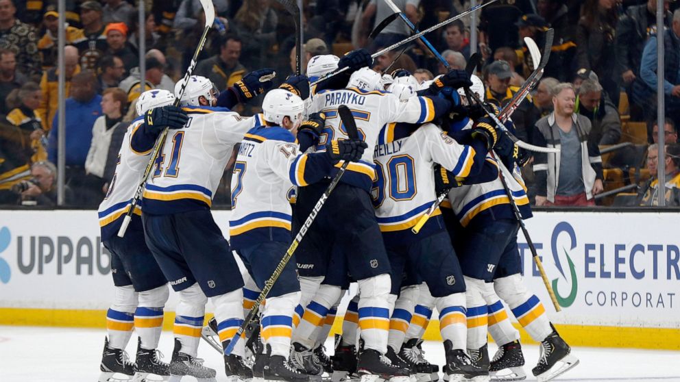 The St. Louis Blues mob Carl Gunnarsson, of Sweden, who scored the winning goal against the Boston Bruins during the first overtime period in Game 2 of the NHL hockey Stanley Cup Final, Wednesday, May 29, 2019, in Boston. (Bruce Bennett/Pool via AP)