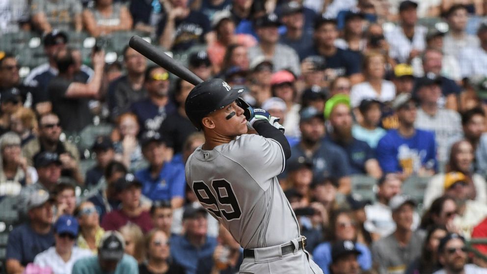 New York Yankees' Aaron Judge hits his fifty eighth homerun during the third inning of a baseball game against the Milwaukee Brewers Sunday, Sept. 18, 2022, in Milwaukee. (AP Photo/Kenny Yoo)