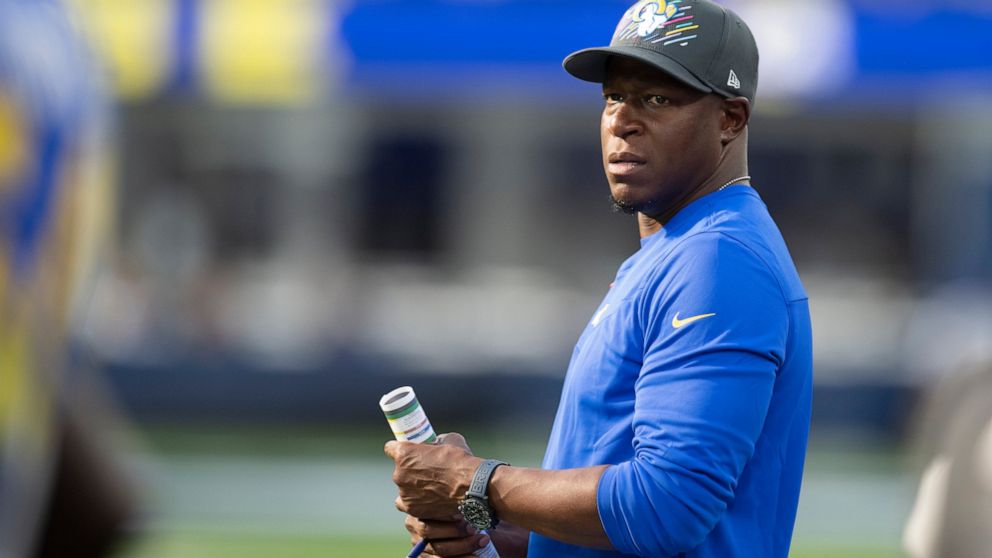 FILE - Los Angeles Rams defensive coordinator Raheem Morris watches players prepare for an NFL football game against the Arizona Cardinals on Oct. 3, 2021, in Inglewood, Calif. Morris is facing the Atlanta Falcons on Sunday just over one season after