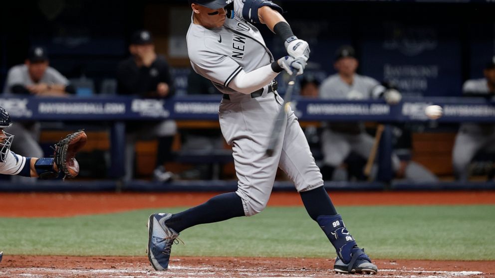 New York Yankees' Aaron Judge hits a home run against the Tampa Bay Rays during the fourth inning of a baseball game Wednesday, June 22, 2022, in St. Petersburg, Fla. (AP Photo/Scott Audette)