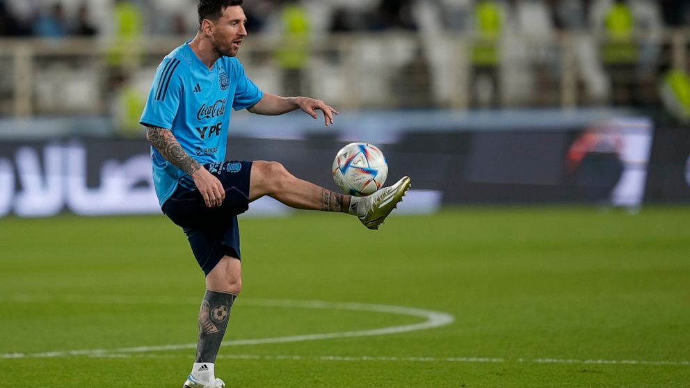 Argentina's Lionel Messi, controls the ball during a training session ahead of their friendly match with UAE on November 16th, in Abu Dhabi, United Arab Emirates, Monday, Nov. 14, 2022. (AP Photo/Kamran Jebreili)