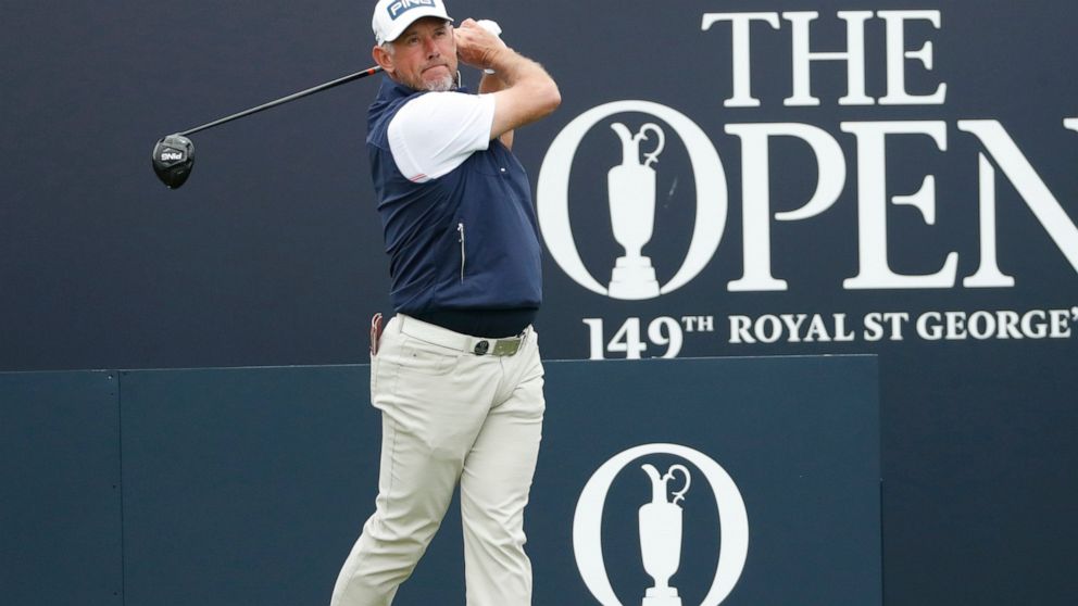 England's Lee Westwood plays his tee shot from the 1st tee during a practice round for the British Open Golf Championship at Royal St George's golf course Sandwich, England, Wednesday, July 14, 2021. The Open starts Thursday, July, 15. (AP Photo/Pete