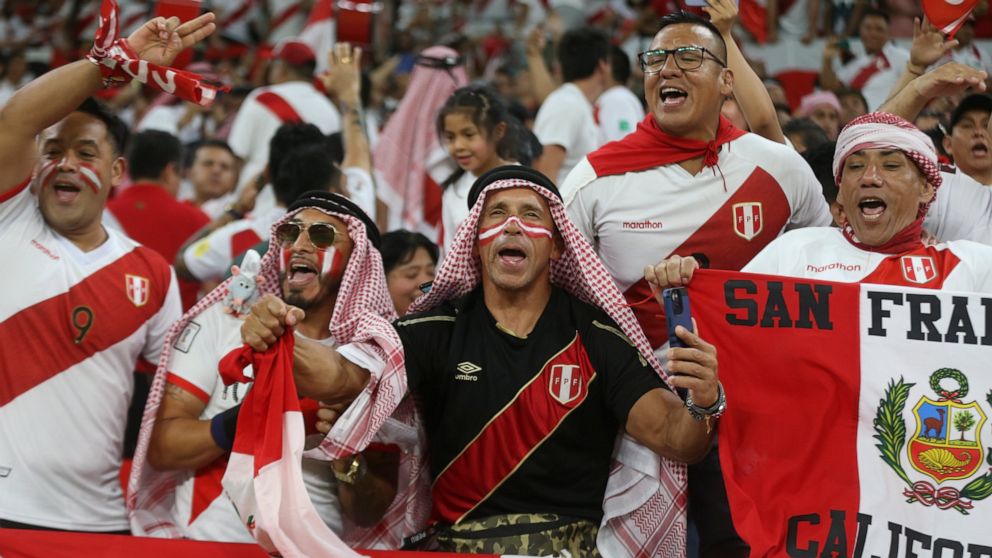 FILE -- Peru fans cheer before the World Cup 2022 qualifying play-off soccer match between Australia and Peru in Al Rayyan, Qatar, Monday, June 13, 2022. Qatar’s ambassador to Germany was personally urged to abolish his country’s death penalty for ho