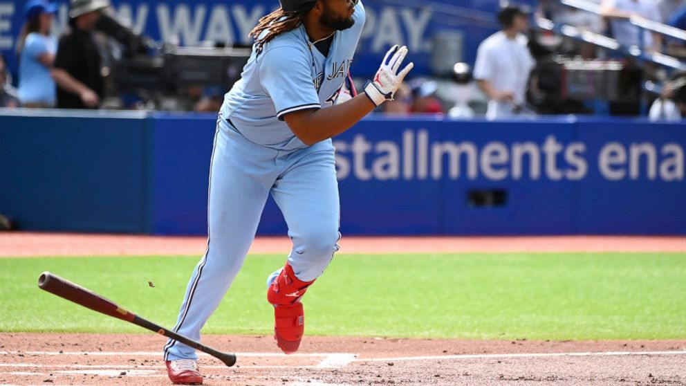 Toronto Blue Jays' Vladimir Guerrero Jr. runs out a ground rule double off Cleveland Guardians starting pitcher Triston McKenzie in first-inning baseball game action in Toronto, Saturday, Aug. 13, 2022. (Jon Blacker/The Canadian Press via AP)