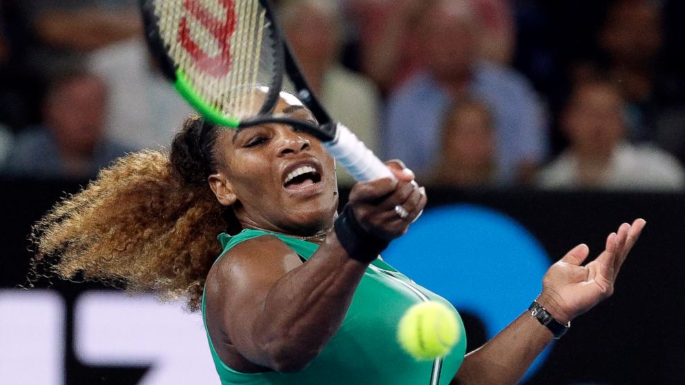 United States' Serena Williams hits a forehand return to Canada's Eugenie Bouchard during their second round match at the Australian Open tennis championships in Melbourne, Australia, Thursday, Jan. 17, 2019. (AP Photo/Aaron Favila)