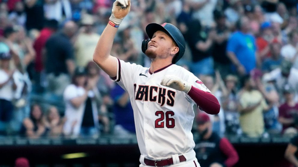 Arizona Diamondbacks' Pavin Smith reacts after hitting a three-run home run against the Atlanta Braves in the first inning during a baseball game, Monday, May 30, 2022, in Phoenix. (AP Photo/Rick Scuteri)