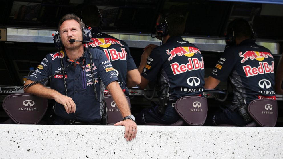 FILE - Red Bull Racing Team principal Christian Horner looks up during the qualifying session for the Japanese Formula One Grand Prix at the Suzuka Circuit in Suzuka, central Japan, Sept. 26, 2015. The Red Bull Formula One team has secured a new titl