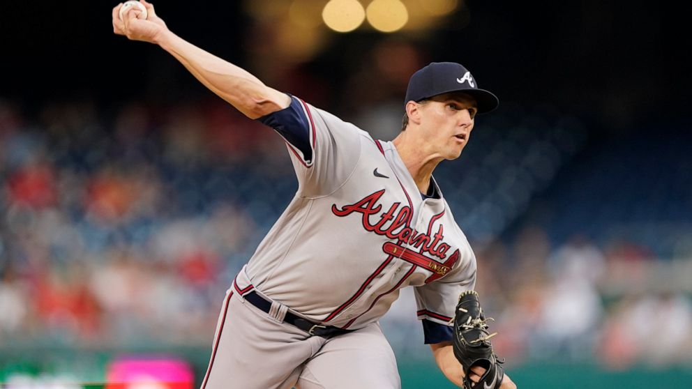 Atlanta Braves starting pitcher Kyle Wright throws to the Washington Nationals in the first inning of a baseball game, Thursday, July 14, 2022, in Washington. (AP Photo/Patrick Semansky)