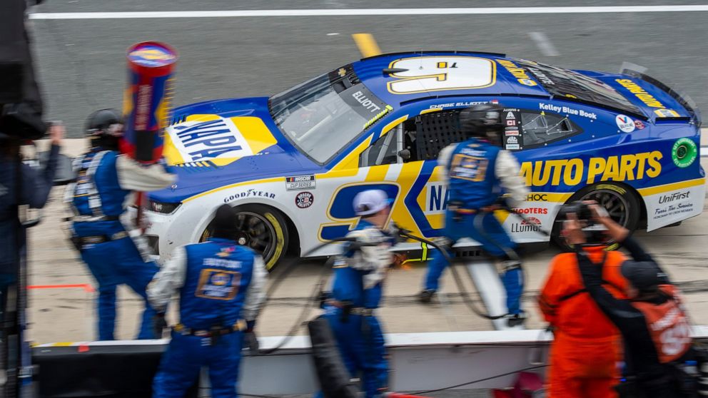 Chase Elliott (9) drives into his pit stop at the NASCAR Cup Series auto race at Dover Motor Speedway, Sunday, May 1, 2022, in Dover, Del. (AP Photo/Jason Minto)