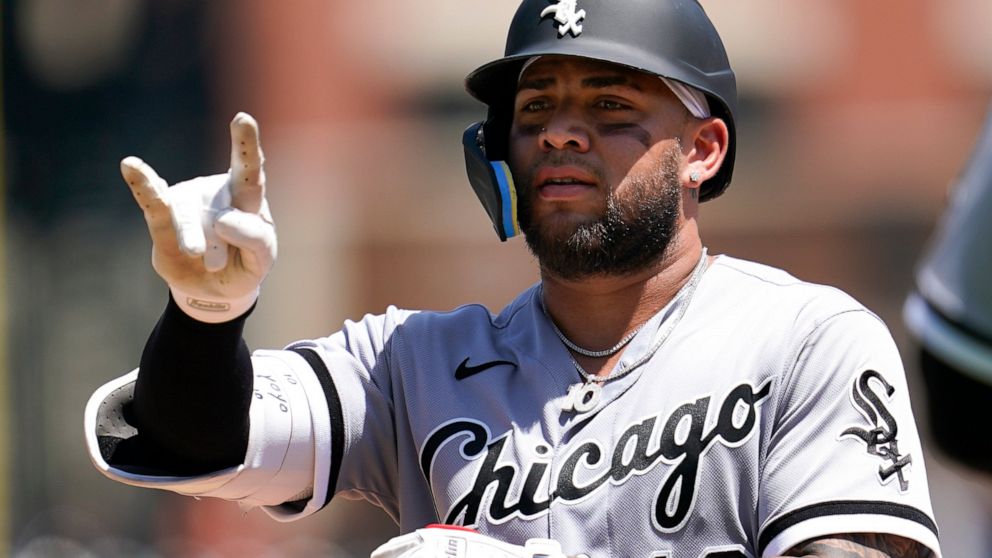 Chicago White Sox's Yoan Moncada reacts to his single against the Detroit Tigers in the fourth inning of a baseball game in Detroit, Wednesday, June 15, 2022. (AP Photo/Paul Sancya)